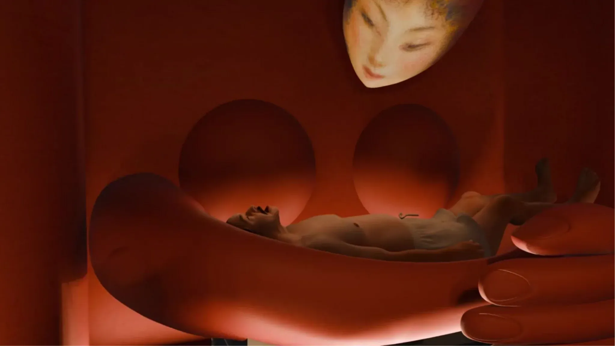  A person lies in a red cradle‑like seat under a serene projected face.